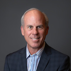 Headshot of Christopher Satovick from First American Exchange Company.